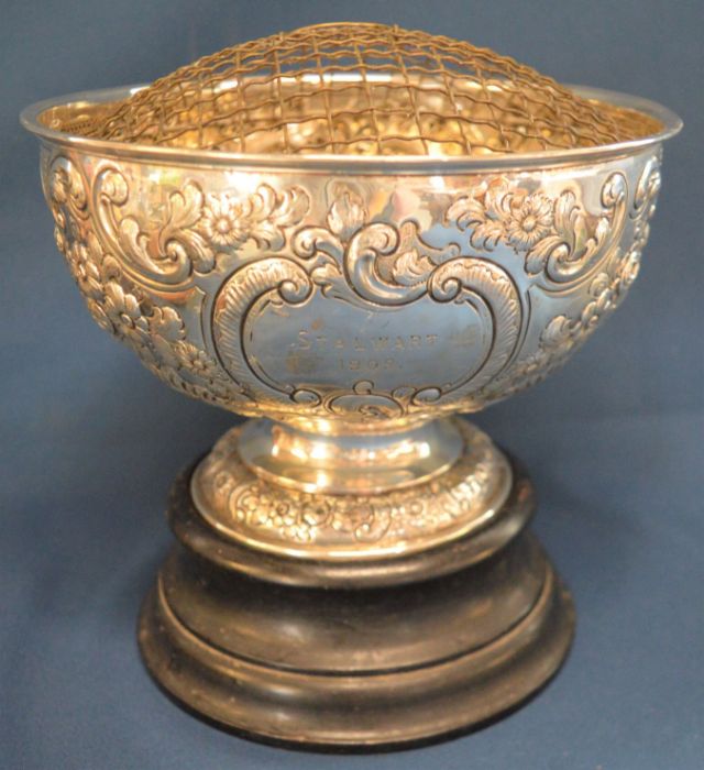 Silver rose bowl on an ebony stand engraved 'Stalwart 1909'. London 1908 diameter 21cm Ht 13cm