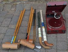 Harrods portable gramophone, vintage croquet mallets, two golf clubs & hockey sticks
