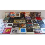 7" vinyl records including, Bonnie Tyler, Iron Maiden, Nils Lofgren, Pat Benatar, Status Quo, Slade,