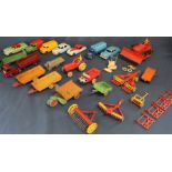 Selection of Dinky toys including farming accessories: disk harrow, hay rack, farm trailers,