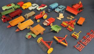 Selection of Dinky toys including farming accessories: disk harrow, hay rack, farm trailers,