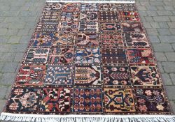 Iranian Bakhtia village rug with panelled design made with natural dyes 200cm by 150cm