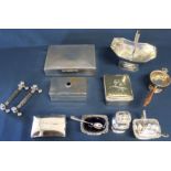 Selection of silver plate including 3 piece cruet, card case, knife rests, tea strainers &