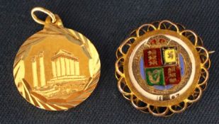 Enamel & gilt shilling coin in 9ct gold mount (5.5g) & gold pendant marked 585 (3.2g)