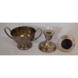 Silver two handled bowl, silver candlestick & a small silver photo frame