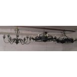 2 gothic style iron hanging ceiling lights and a metal 6 arm chandelier type light fitting