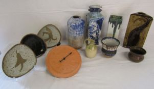 Collection of pottery items including vases, plates etc