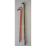 5 glass canes - clear glass spirally moulded walking stick containing central light amber - clear