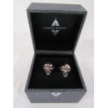 Boxed pair of silver designer Stephen Webster Dracula head cufflinks with red bead eyes, weight 0.