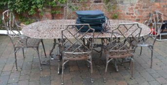 Large cast aluminum garden table (L 213cm by 96cm) with 6 chairs with cushions