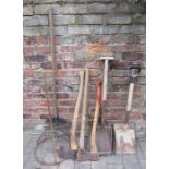 Various garden tools including axes, shovels, fork etc