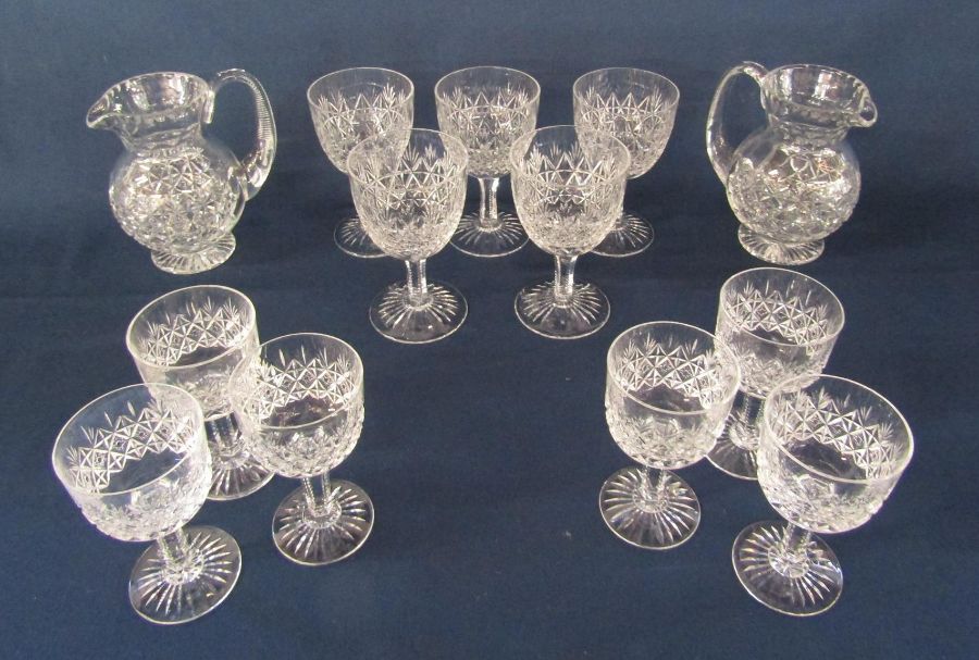 Thomas Webb crystal comprising 2 small water jugs, 5 red wine glasses and 6 wine/port glasses