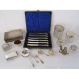 Collection of silver to include dressing table bottles with silver lids, silver cigarette case,