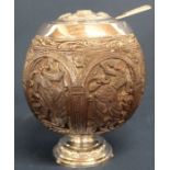 19th century Anglo Indian white metal mounted lidded coconut pot with carved decoration