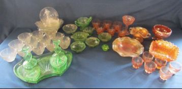Carnival glass, green glass including dressing table tray and glass cups and saucers