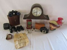Mixed collection of items including cranberry glass jug, Kodak Brownie camera, vintage tin toy,