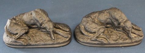 Pair of recumbent deerhound figures after Gayrard