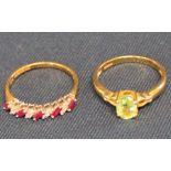 18ct gold ruby & diamond set ring and 18ct gold peridot solitaire set ring, total weight 5.58g