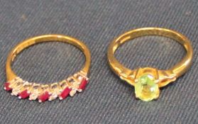18ct gold ruby & diamond set ring and 18ct gold peridot solitaire set ring, total weight 5.58g