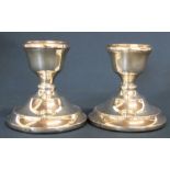 Pair of silver candlesticks with loaded bases Birmingham 1968