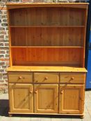 Pine dresser with cupboards and drawers approx. 123cm x 177cm x 39cm