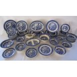 Blue and white willow pattern part dinner services including Churchill, Wood & Sons and ironstone