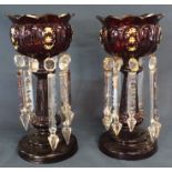 Pair of ruby glass lustres with clear glass drops - some missing / wrong size - one lustre has crack