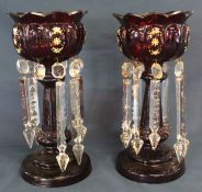 Pair of ruby glass lustres with clear glass drops - some missing / wrong size - one lustre has crack