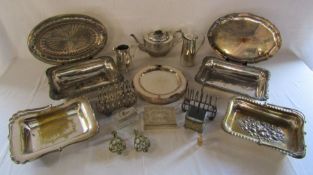 Collection of silver plate to include teapot, plate warmer, toast racks etc
