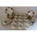 Royal Albert 'Old Country Roses' mugs, plates gravy boat, salt & pepper pots and a candle holder