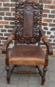 Ornately carved oak 17th century style  open armchair