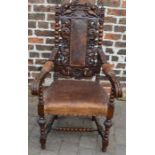 Ornately carved oak 17th century style  open armchair