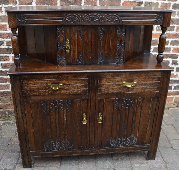 Carved oak court cupboard L 124cm Ht 134cm D 47cm