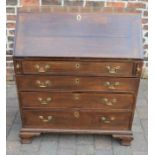 Georgian oak bureau on ogee bracket feet with brass swan neck handles H 109cm W 99cm D 54cm