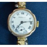 Ladies wristwatch in a 9ct gold case with plated with white dial marked Bortners