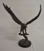 Large bronze eagle in flight on a marble base, H59cm x W47cm