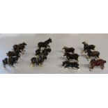 12 small ceramic working horses, including 6 with harnesses