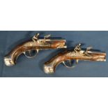 Pair of 19th century pocket flintlock pistols stamped (possibly Clert's) Paris with inlaid white