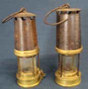 Two brass miners lamps - one marked Patterson & Co Newcastle On Tyne