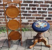 Victorian swivel piano stool with needlepoint seat and number stamped on central column &