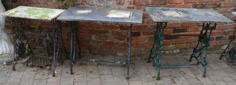 3 treadle sewing machine bases made into garden tables