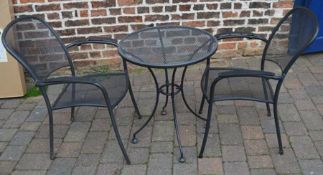 Metal patio table and 2 chairs and metal wine rack