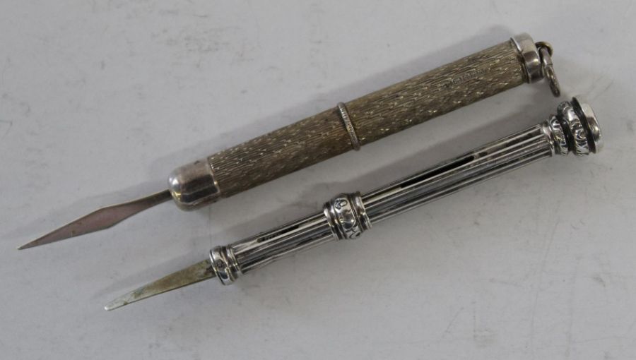 S. Mordan & Co white metal and a silver possibly William Manton 1990 retracting tooth picks