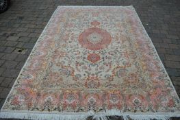 Large pink ground Persian carpet with stain, 300cm x 204cm