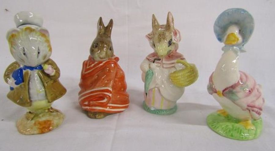 4 Beswick Beatrix Potter figures - Amiable Guinea Pig, Poorly Peter Rabbit, Mrs Rabbit and Jemima