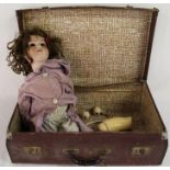 Armand Marseille 390 bisque head doll in a small case