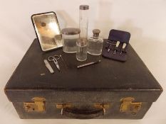 Ladies blue leather travelling case with some contents including PWG silver topped bottles, sterling