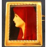 Maltese enamel brooch made by Mr Agius, depicting female head in profile, set in tested as 18ct gold