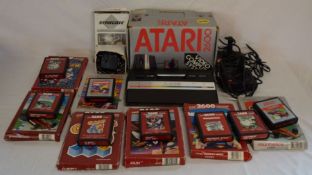 Vintage Atari 2600 Video Computer system TV game with 8 gaming cartridges