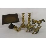 Collection of brass including heavy cast horse and dogs, book stand, candlesticks etc